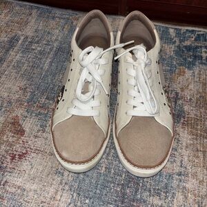 Women’s snake skin tennis shoes